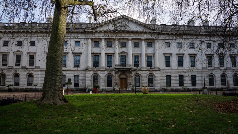 China embassy at Royal Mint Court, featuring diplomatic architecture in a business district setting.