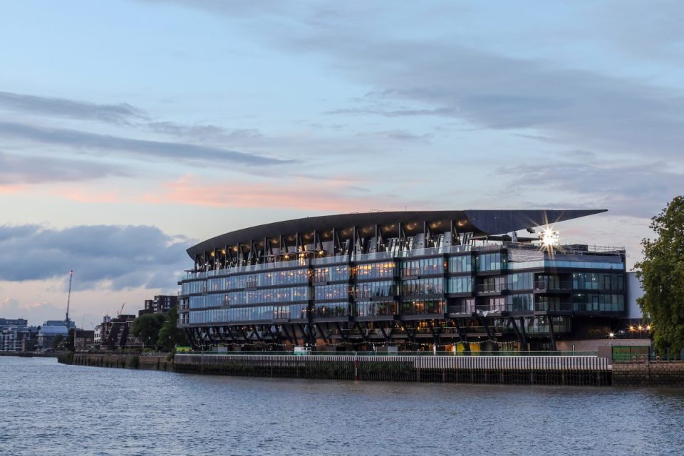 Fulham Riverside Stand with Morning Wire branding, showcasing urban development and architecture at Fulham riverside area
