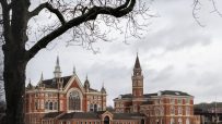 Dulwich College London historic main building with lush green grounds, highlighting prestigious private school setting