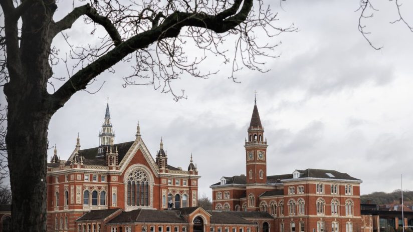 Dulwich College London historic main building with lush green grounds, highlighting prestigious private school setting