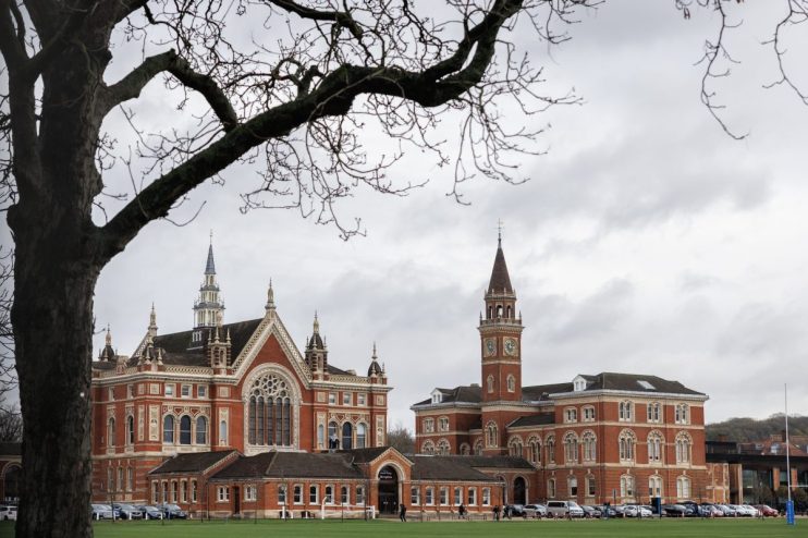 Dulwich College London historic main building with lush green grounds, highlighting prestigious private school setting