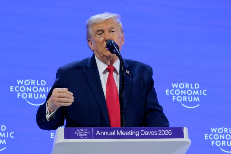GettyImages 2257409203 showing a significant news event with key figures engaging in a formal discussion at a business con...