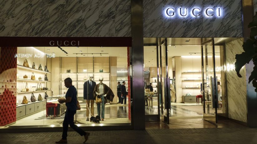 Gucci fashion collection showcase featuring models on the runway wearing the latest luxury clothing designs