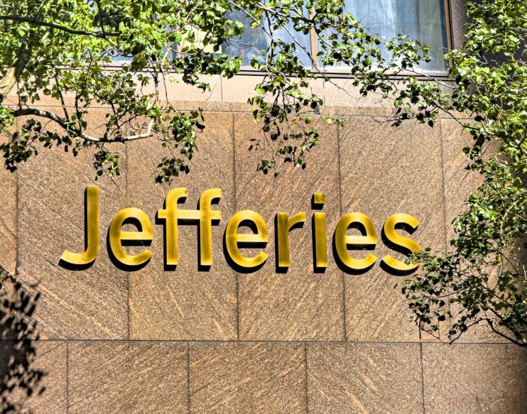 Jefferies logo prominently displayed on a modern office building facade, reflecting the companys financial industry presence.