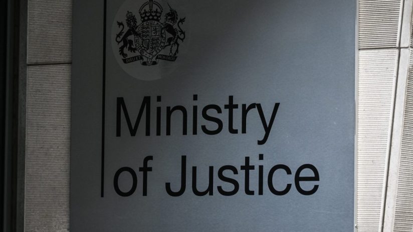 Ministry of Justice building exterior with government signage and clear sky backdrop
