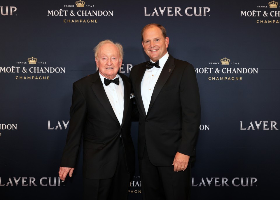 Rod Laver and Tony Godsick in conversation at a Boston event, 2021, highlighting tennis legends and sports management exec...