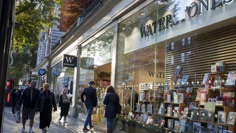 Waterstones bookstore floats on water, showcasing innovative design and unique marketing strategy in urban setting.