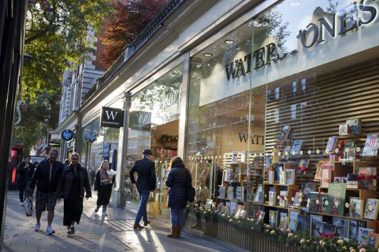 Waterstones bookstore floats on water, showcasing innovative design and unique marketing strategy in urban setting.