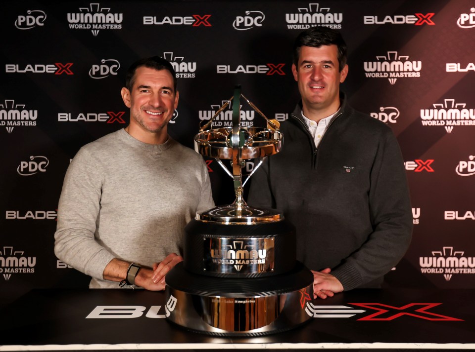 Winmau and PDC partnership announcement showcasing new dartboard design with official branding in a professional setting