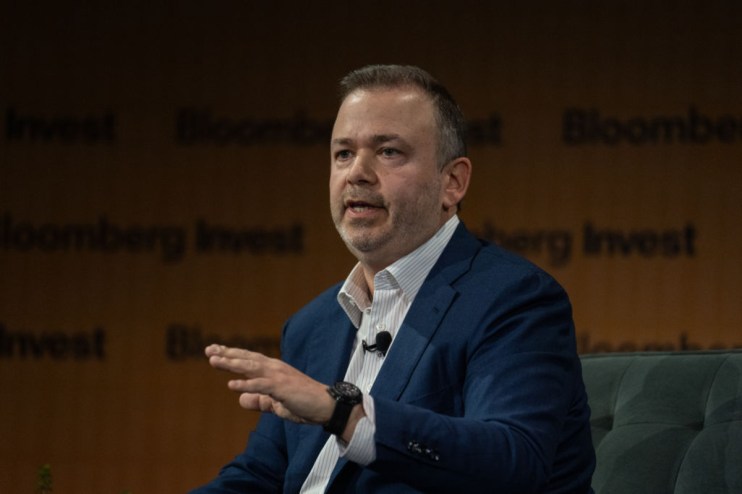 Boaz Weinstein, founder of Saba Capital, in a professional setting discussing financial strategies and market insights