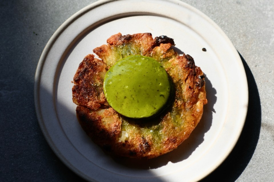 The potatoes with verde butter provide a welcome splash of colour at Alta