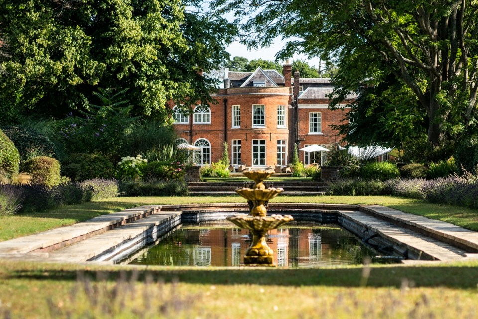 Royal Berkshire hotel entrance with clear signage, highlighting its modern architecture and busy surroundings