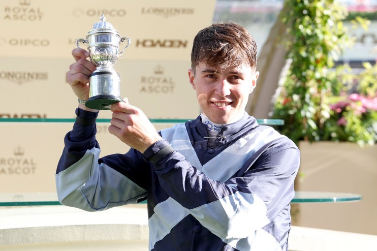 Dylan Browne McMonagle, jockey, in action during a horse race, showcasing intense focus and competitive spirit