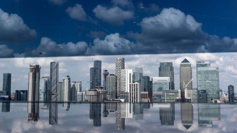 Skyline of Canada financial district with modern skyscrapers and historic landmarks under a clear blue sky