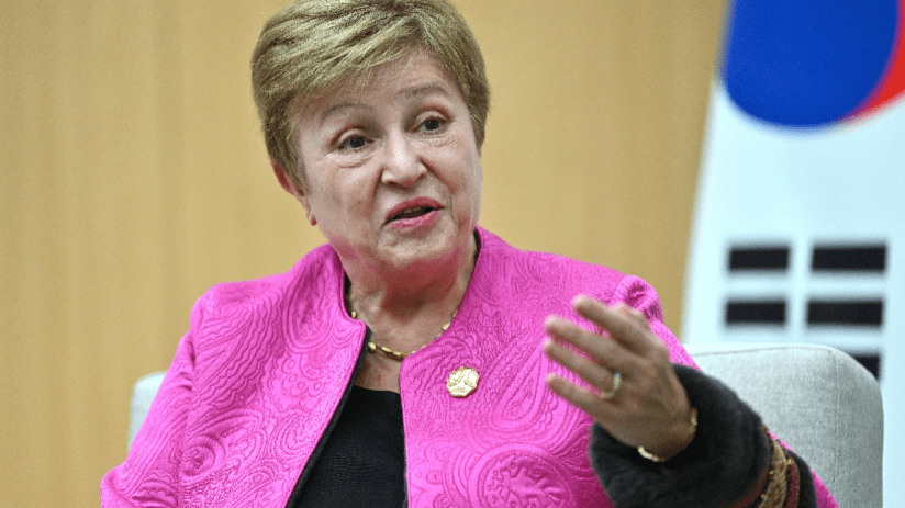 IMF Managing Director Kristalina Georgieva speaking at a press conference, addressing global economic challenges.