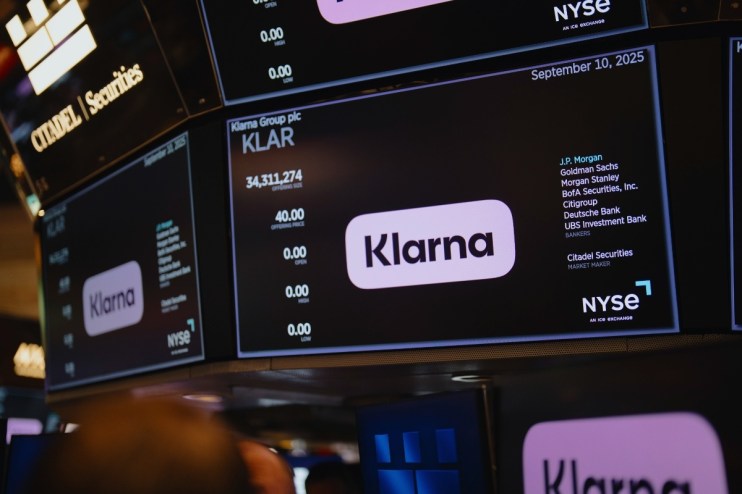 Klarna IPO trading scene with stock market charts and business professionals discussing investment strategies