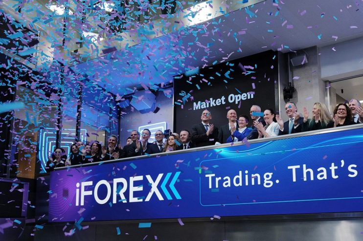 London Stock Exchange building exterior with digital forex data display reflecting financial market trends