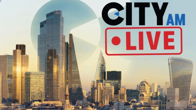 Breaking news live blog update graphic with a digital clock and world map backdrop for a real-time information feed.