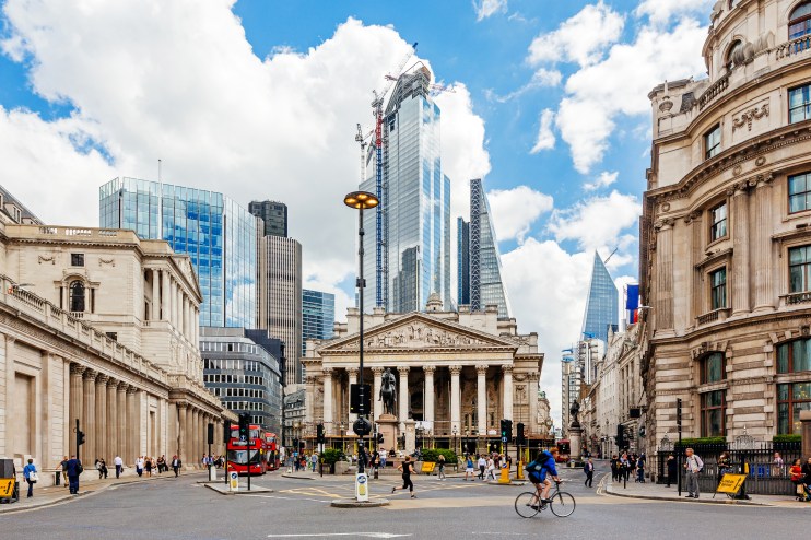 London cityscape showcasing iconic landmarks under a clear sky, highlighting the urban landscape and architectural beauty.