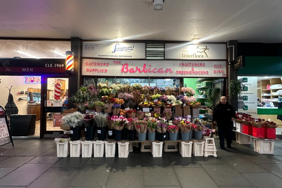 Longmans Florist storefront in Canada displaying vibrant floral arrangements and seasonal bouquets
