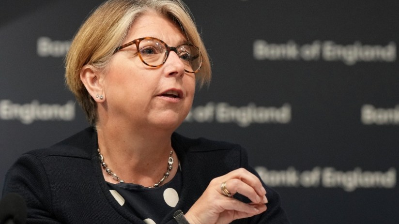 Bank of England deputy governor Breeden discusses economic policies during a press conference