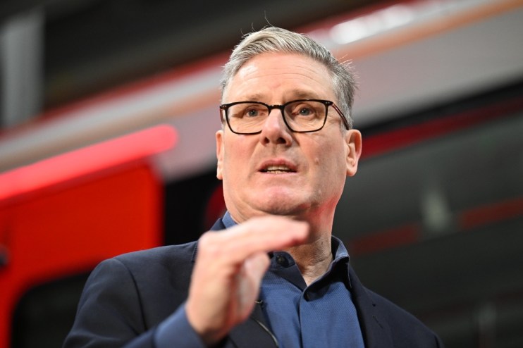 Keir Starmer engaging with community members during his visit to South Wales, highlighting local issues and leadership ini...