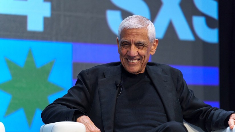 Vinod Khosla speaking at SXSW 2024, addressing tech innovations and entrepreneurship, wearing a suit on stage.