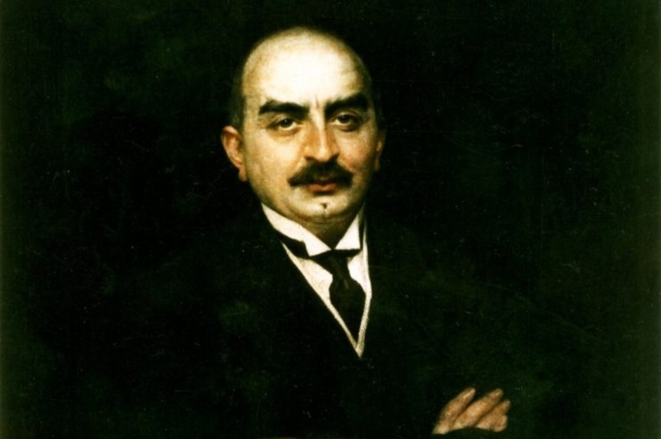 Calouste Gulbenkian portrait showcasing his influential role in business and philanthropy, wearing a formal suit and tie.