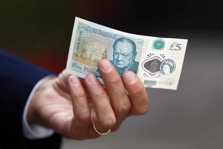 Winston Churchill on British banknote, highlighting historical figures influence on currency design and UK heritage