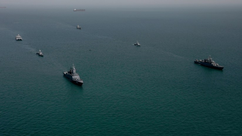 Investec logo displayed prominently, symbolizing financial services expertise and corporate identity in business news context