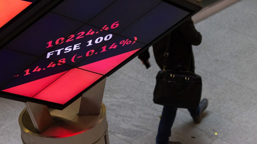 Londons Stock Exchange orb with FTSE 100 display, symbolizing business and market updates