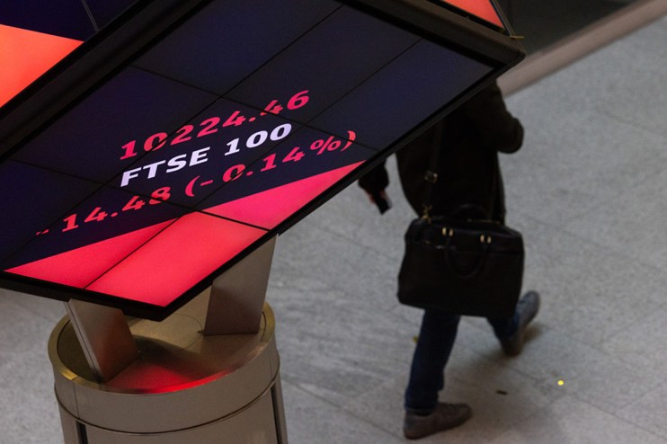 Londons Stock Exchange orb with FTSE 100 display, symbolizing business and market updates
