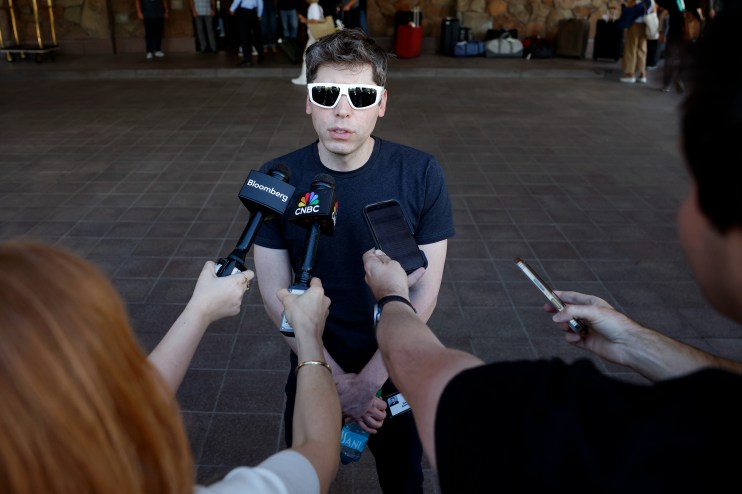 Sam Altman discussing advancements in ChatGPT AI technology at a business conference.