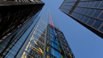 Skyline of Canada with iconic financial district buildings, highlighting UK investments and economic growth.