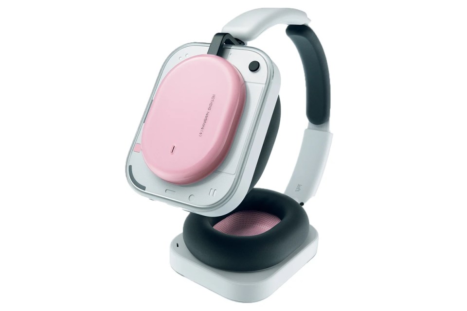 Sleek wireless headphones with noise-canceling technology lying on a minimalist desk surface