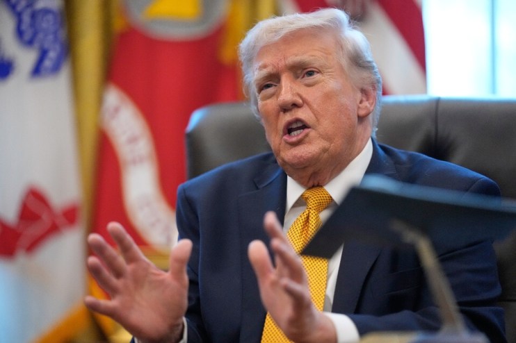 Donald Trump speaking at the PAAP office conference, addressing key political issues and strategies in a formal setting.