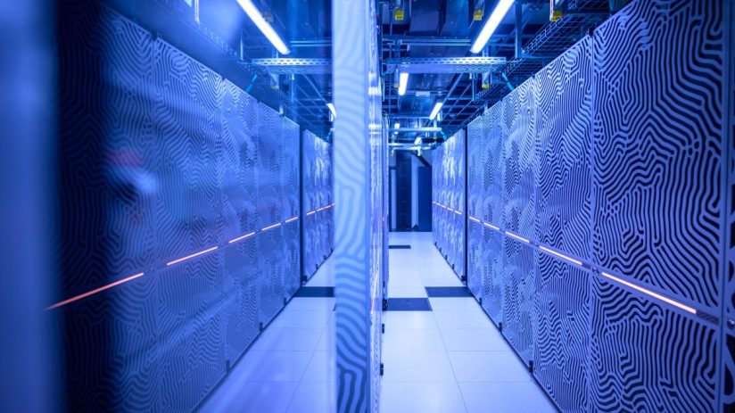 AI data center with rows of servers and cooling systems, showcasing advanced technology and infrastructure innovation
