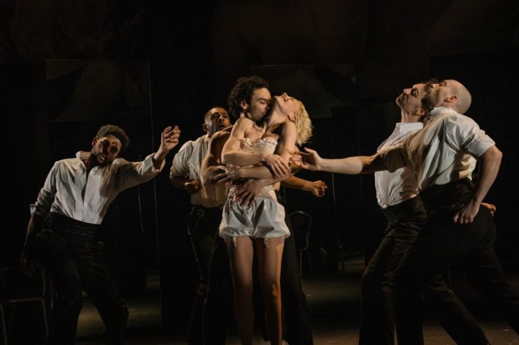 Aiden Turner performs in period costume in a scene from Les Liaisons Dangereuses at a theater production.