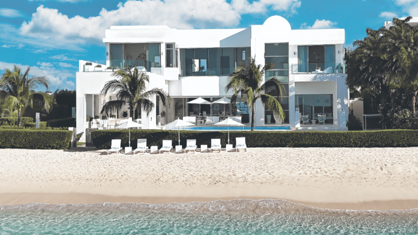 Scenic view of Anguillas pristine Caribbean beaches with turquoise waters and clear blue skies, highlighting island paradise.