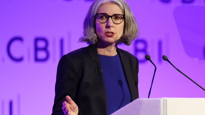 CBI Chief Rain Newton-Smith advocating for North Sea oil and gas licences at a press conference podium