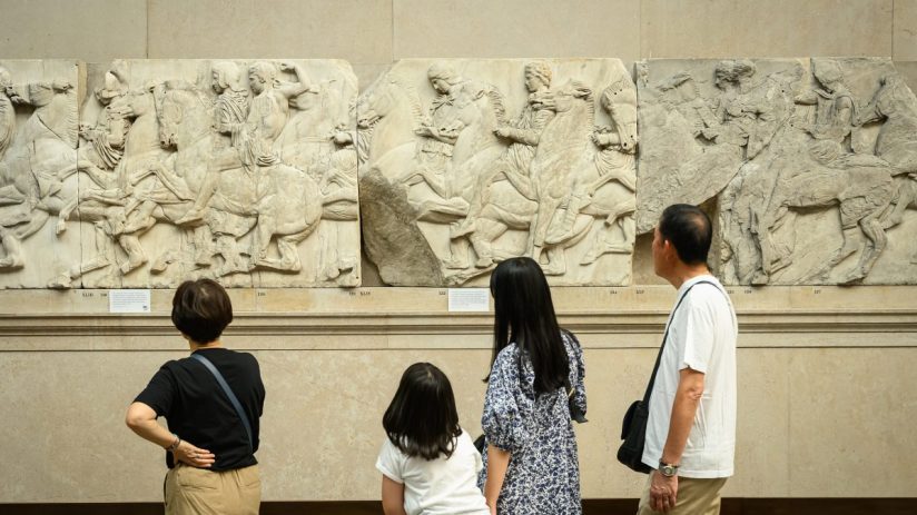 Elgin Marbles displayed in the British Museum, showcasing detailed ancient Greek sculptures and historic artistry.