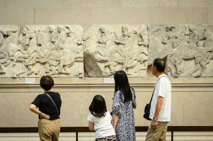 Elgin Marbles displayed in the British Museum, showcasing detailed ancient Greek sculptures and historic artistry.