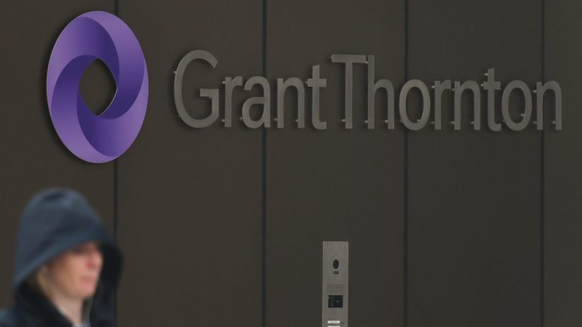 Grant Thornton logo prominently displayed on a modern office building facade, symbolizing global business advisory services.