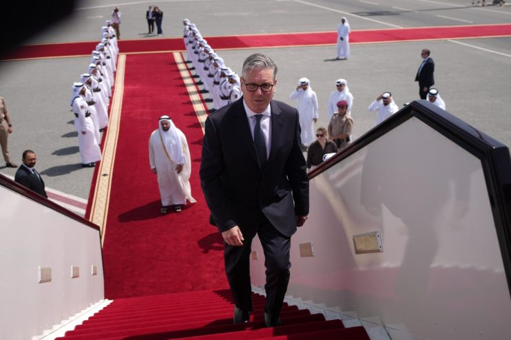 Keir Starmer engaging in discussions during his Gulf visit, highlighting diplomatic relations and regional cooperation ini...
