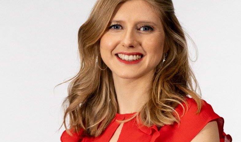 Marianna Hunt in a vibrant landscape setting, showcasing natural beauty and tranquility, suitable for a news/business feat...