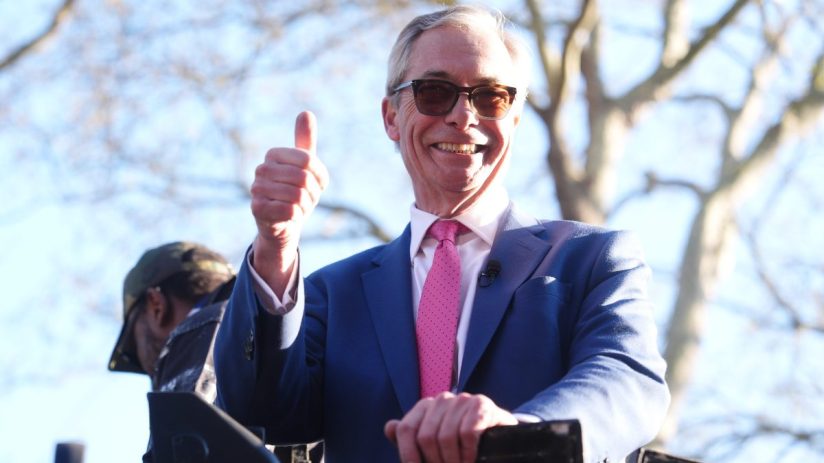 Nigel Farage promoting Bitcoin investment opportunity at a business event