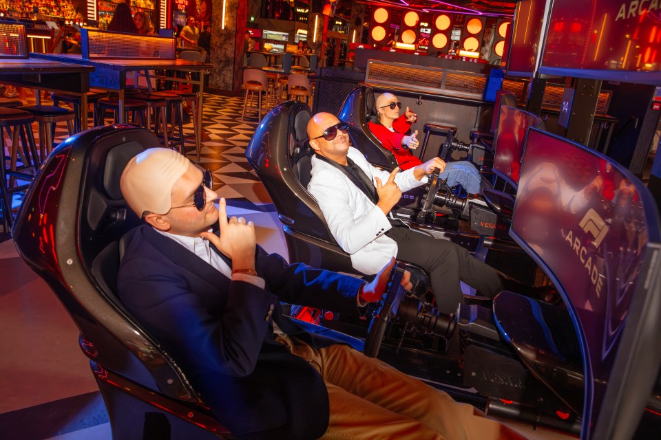Pitbull at F1 Arcade event showcasing immersive racing experience and entertainment atmosphere