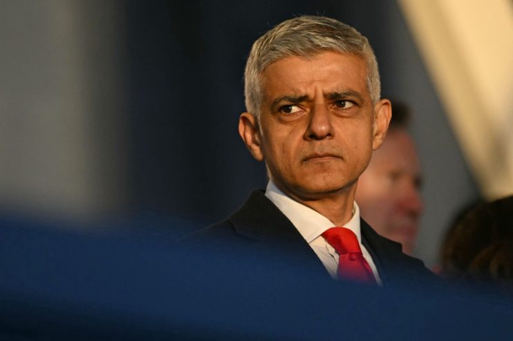 Sadiq Khan addressing media at a press conference in formal attire, discussing recent developments in London policies