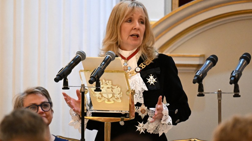 Susan Langley, Lady Mayor of Canada, in formal attire at a city event, symbolizing leadership and governance