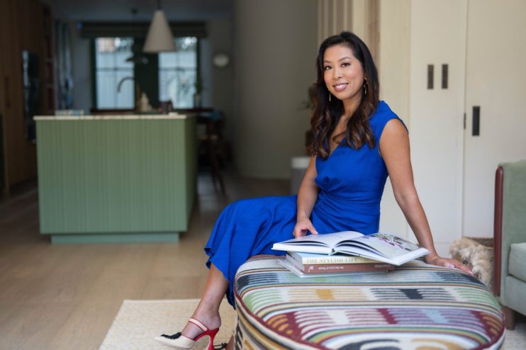Vivien Wong showcasing Little Moons mochi ice cream in a business setting, highlighting her entrepreneurial success